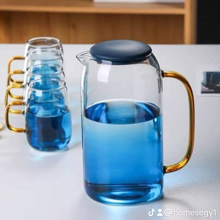 طقم شربات زجاج أزرق شفاف أنيق مع دورق و4 أكواب يد ذهبي