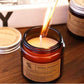 برطمان شمع معطر بديكور زجاجي أنيق يمنح رائحة منعشة