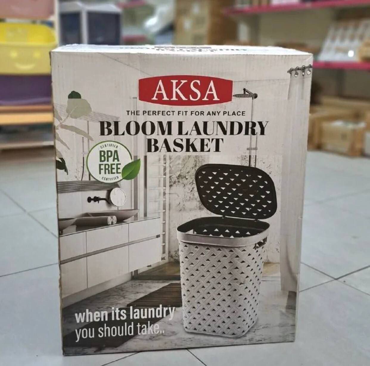 سبت غسيل بلوم من اكسا 60 لتر بغطاء محكم باللون الروز مصنوع من بلاستيك متين