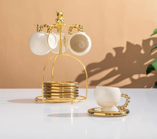 طقم شاي بورسلين أبيض مدهب بيد دهبي بابلز مستورد 13 قطعة مع حامل استيل جولد دبدوب فاخر